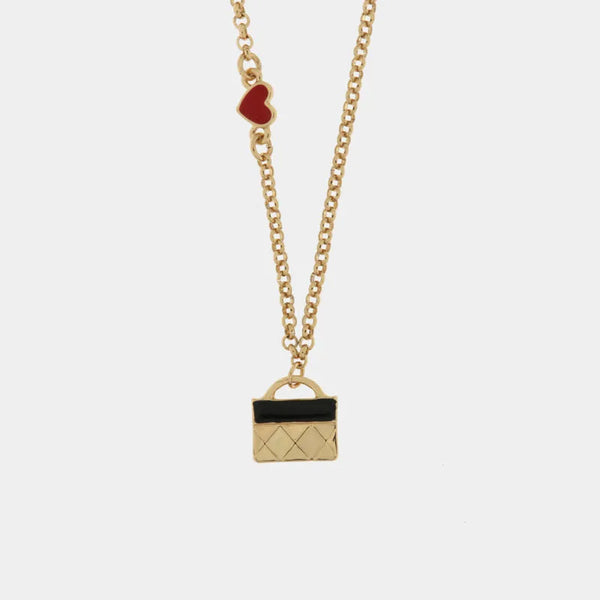 Collana in Metallo con borsa nera — collezione arco naturale