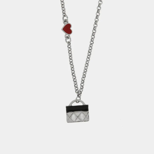 Collana in Metallo con borsa rettangolare nera — collezione arco naturale