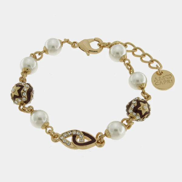Bracciale in Metallo con perle banche e nere — collezione aurora caprese