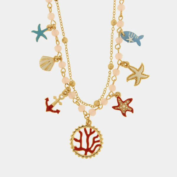 Collana in Metallo con stelle marine, conchiglie, pesciolino, ancora e corallo — collezione bellezza