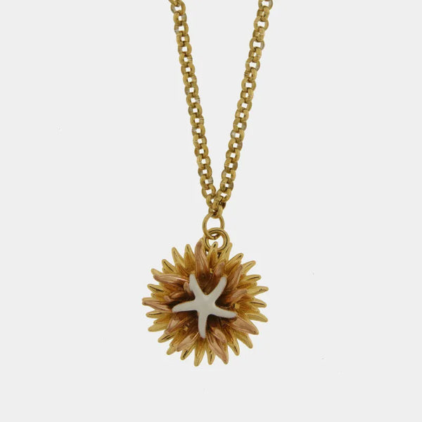 Collana in Metallo con riccio di mare placcato oro e stella bianca — collezione erisos