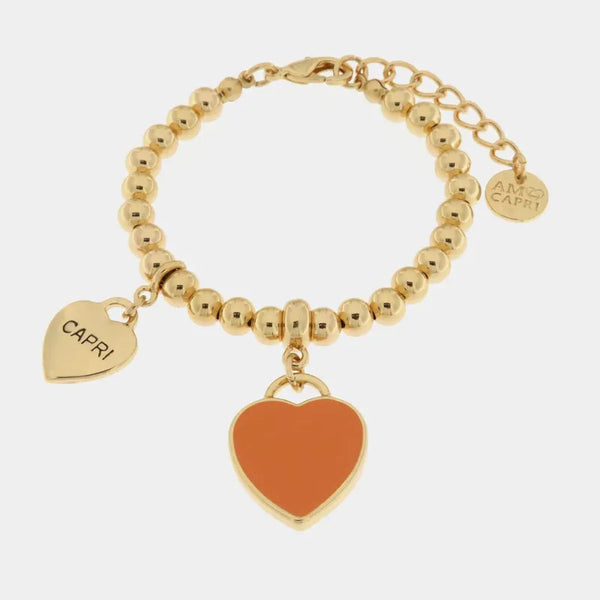Bracciale in Metallo con cuore arancione pendente — collezione Faraglioni