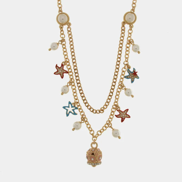 Collana in Metallo multifilo con sfere, stelle marine e campanella con cerchi rosa e cristalli luminosi — collezione Onda Azzurra