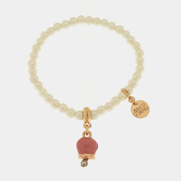 Bracciale in Metallo Bracciale in Metallo con perle e campanella portafortuna in smalto rosa — collezione tragara
