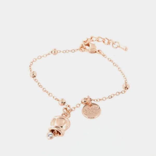 Bracciale in Metallo con campanella portafortuna pendente, impreziosita da punto luce — collezione tragara