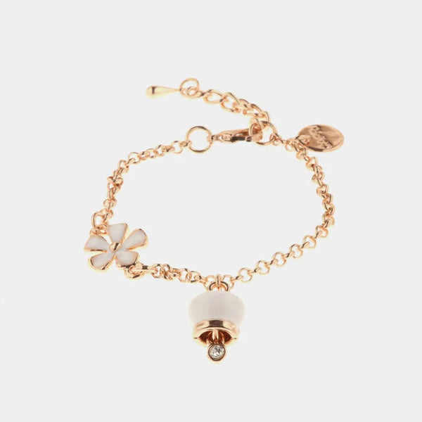 Bracciale in Metallo con campanella portafortuna pendente smaltata bianca e dettaglio a forma di fiore smaltato bianco — collezione tragara